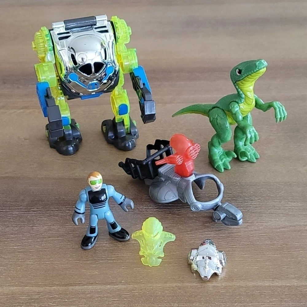 Fisher-Price Imaginext Raptor Doc & Exo Suit Dinosaur Figure Toy Set